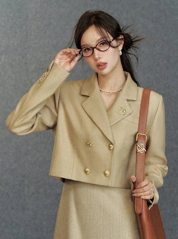 Double-Breasted Cropped Blazer: Tailored Short Jacket with Embroidered Logo Welt Pockets Slit Pockets Flap Pockets Double-Breasted Cropped Blazer: Tailored Short Jacket with Embroidered Logo Welt Pockets Slit Pockets Flap Pockets
